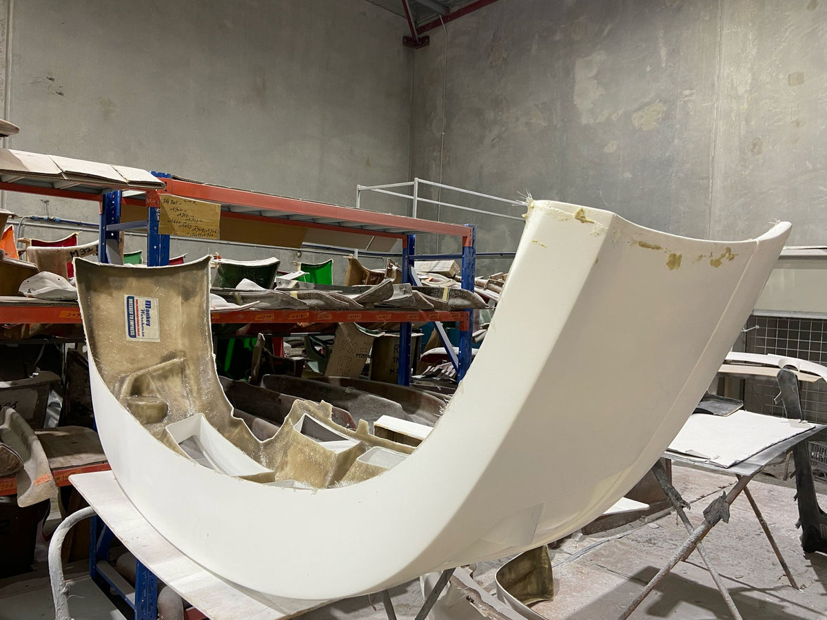 Raw Hand Laid FRP Front Bumper requiring prep work