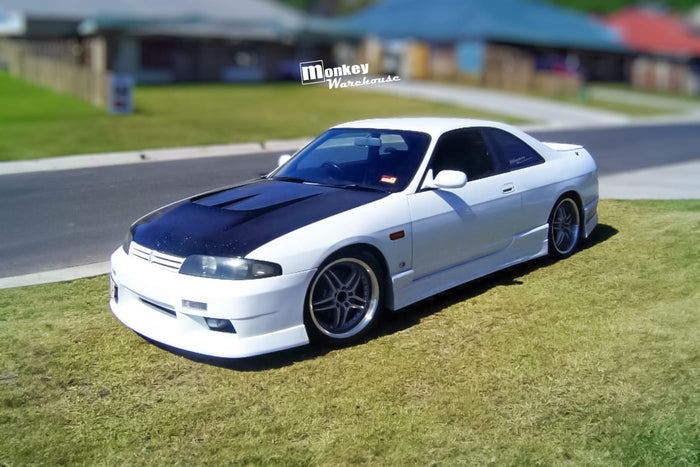 Nissan Skyline R33 GTS-T with customer-installed Body Kit Monkey Warehouse Front Bumper