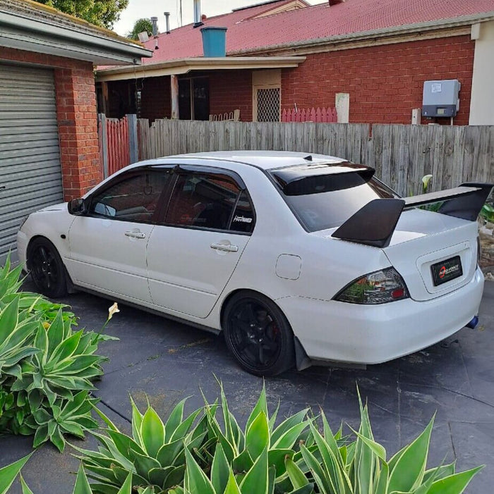 Mitsubishi Lancer Evolution with customer-installed HIC Rear Roof Spoiler
