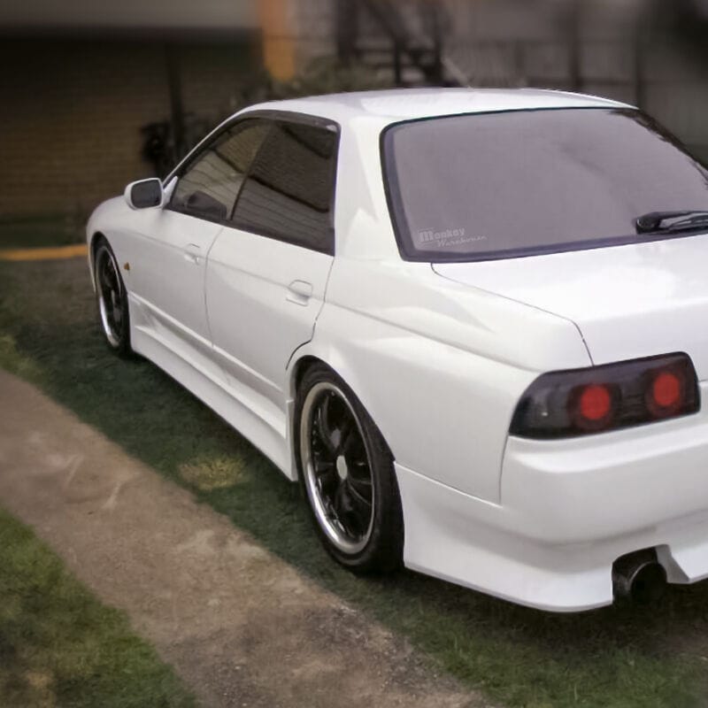 Installed View - Nissan Skyline R32 Sedan: Vertex Style Side Skirts