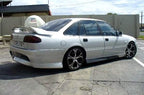 Installed View - Holden Commodore VR VS Sedan: VX Style Conversion Side Skirts