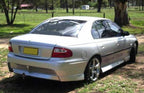 Installed View - Holden Commodore VT VX Sedan: GTO Style Conversion Side Skirts