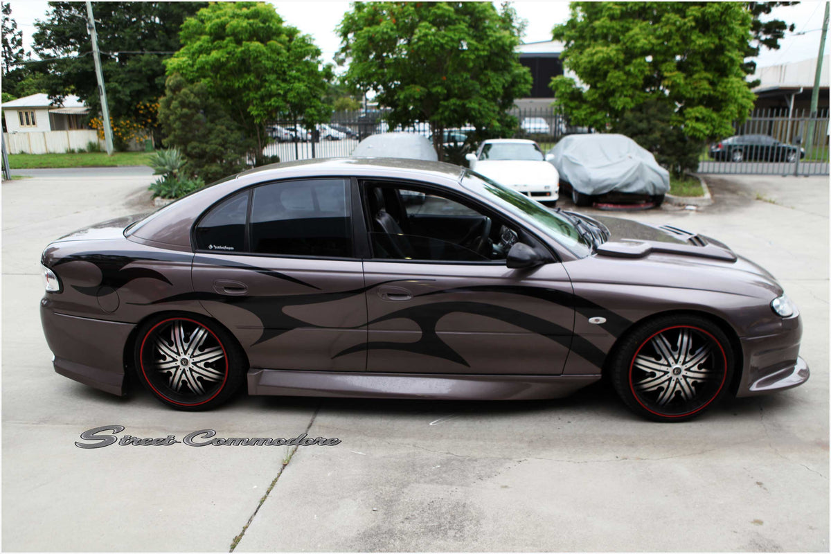 Super V8 Race style side skirts shown fitted to a VT-VX Commodore Sedan for reference, side view