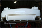Super V8 rear bumper for Holden Commodore VY VZ Sedan in raw white gel coat, outer face with recessed lower centre