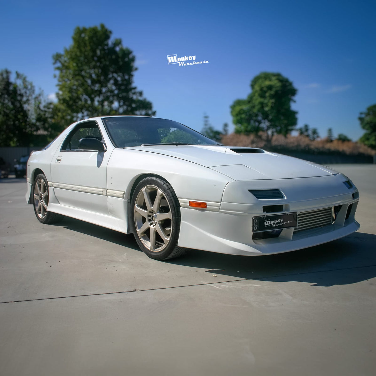 Installed View - Mazda RX7 FC: Vanquish Style Front Bumper