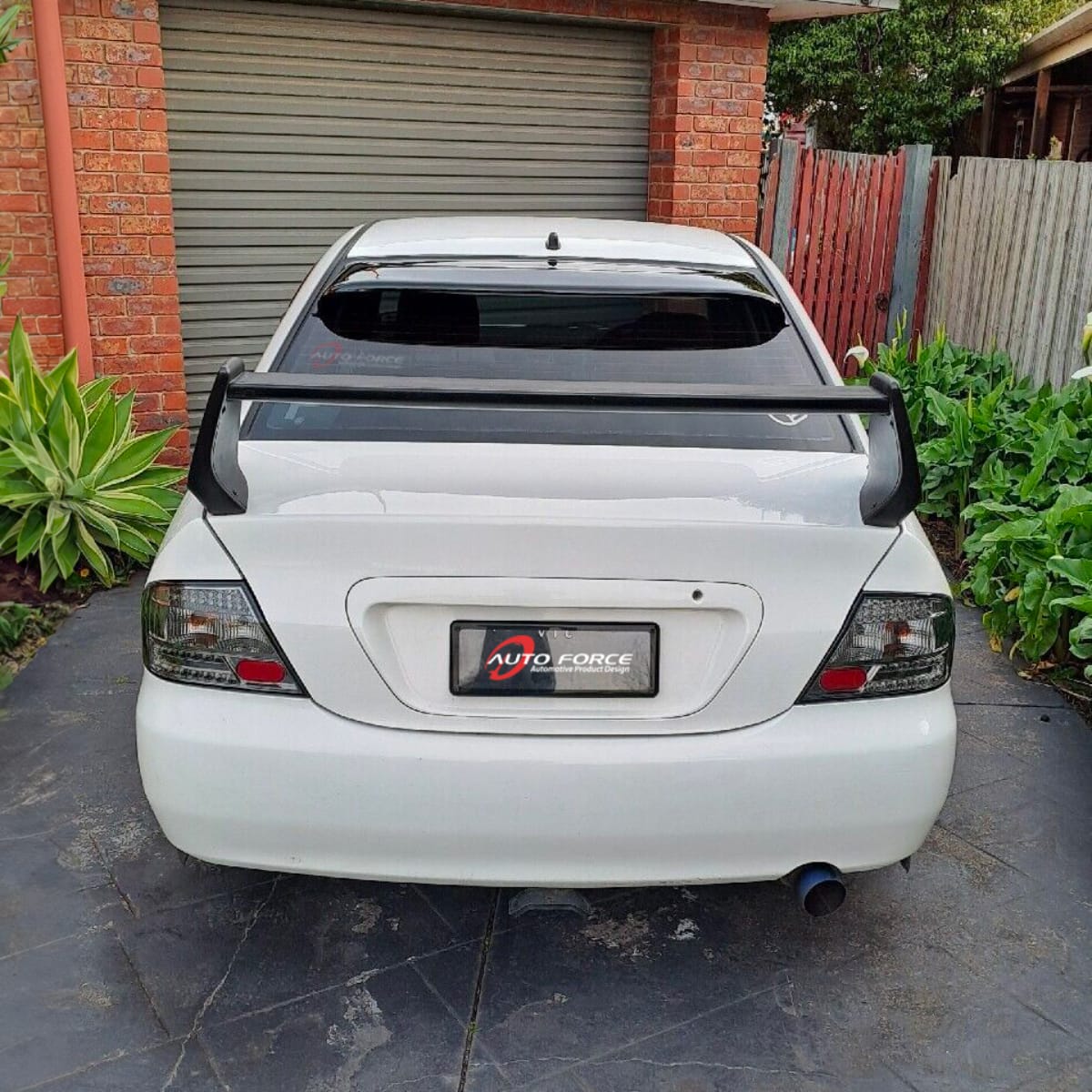 Installed View - Mitsubishi Evolution 7 8 9 Sedan (2001-2007): Premium Roof Spoiler