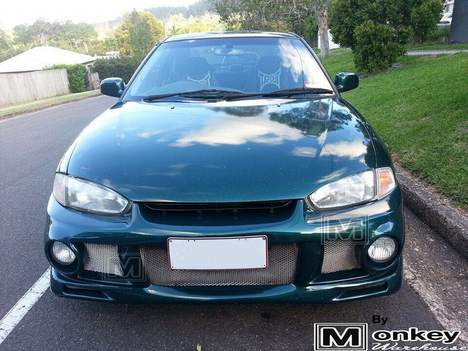 Installed View - Mitsubishi Lancer CE Coupe: Evo 6 Style Front Bumper