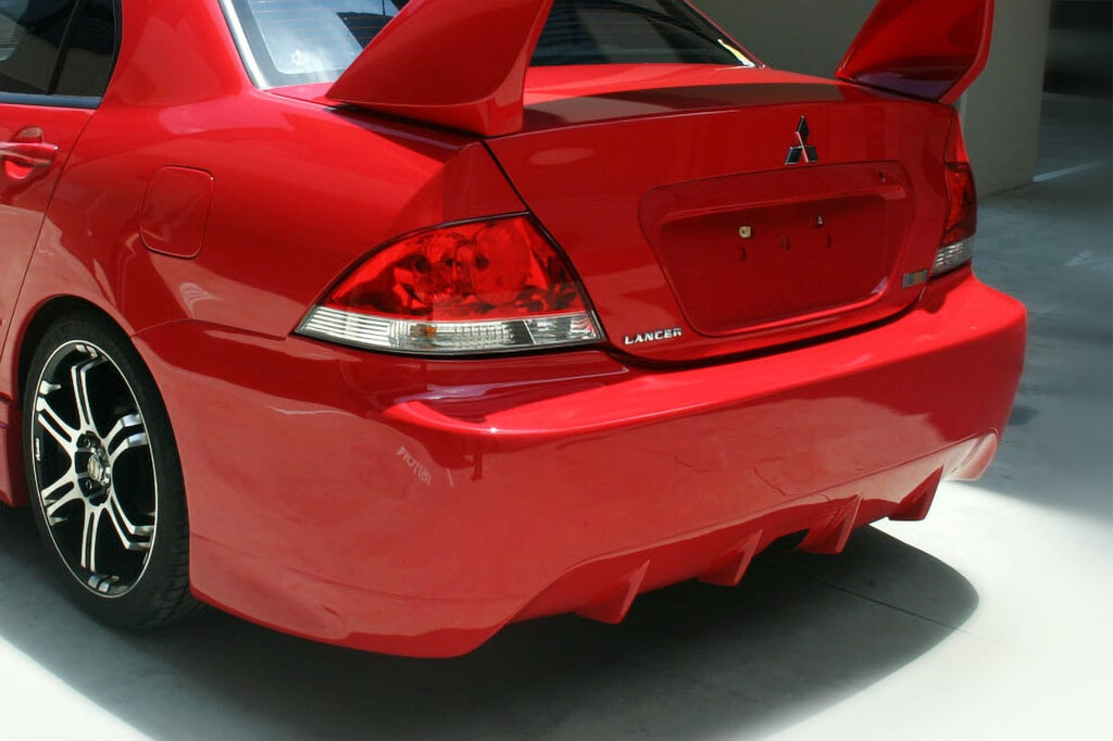 Installed View - Mitsubishi Lancer CH Sedan: Accolade Style Rear Bumper