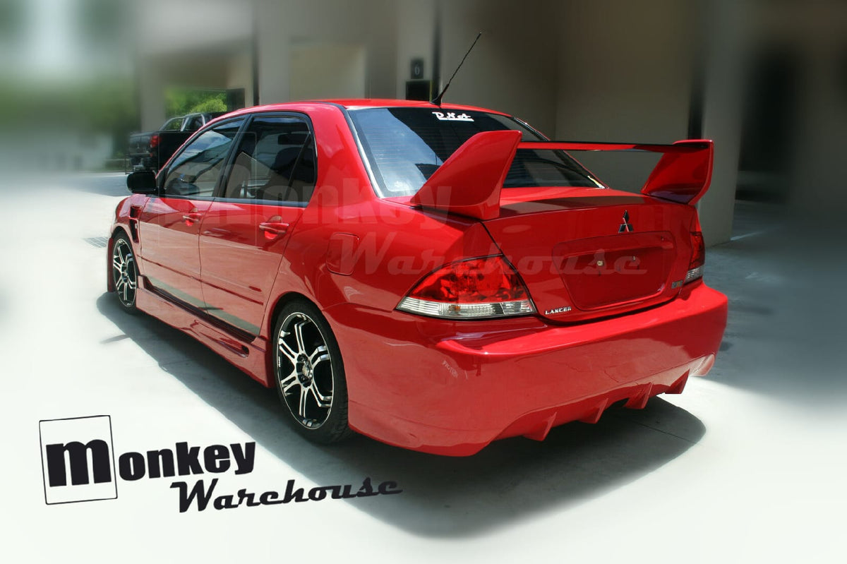 Installed View - Mitsubishi Lancer CH Sedan: Accolade Style Rear Bumper