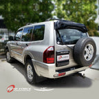 Installed View - Mitsubishi Pajero NM NP (1999-2006): Premium Roof Spoiler Dust Deflector