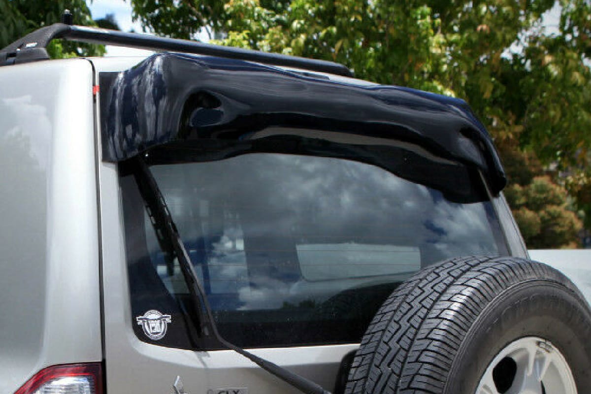 Installed View - Mitsubishi Pajero NM NP (1999-2006): Premium Roof Spoiler Dust Deflector