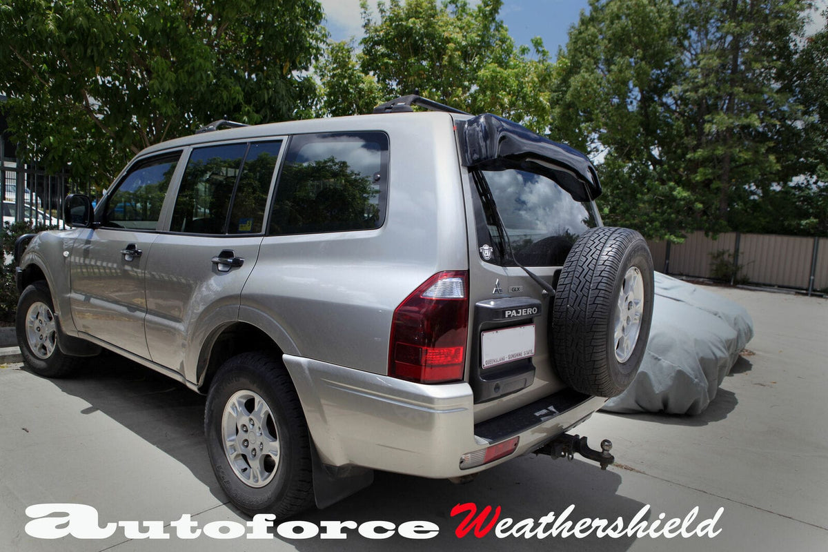 Installed View - Mitsubishi Pajero NM NP (1999-2006): Premium Roof Spoiler Dust Deflector