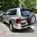 Installed View - Mitsubishi Pajero NM NP (1999-2006): Premium Roof Spoiler Dust Deflector