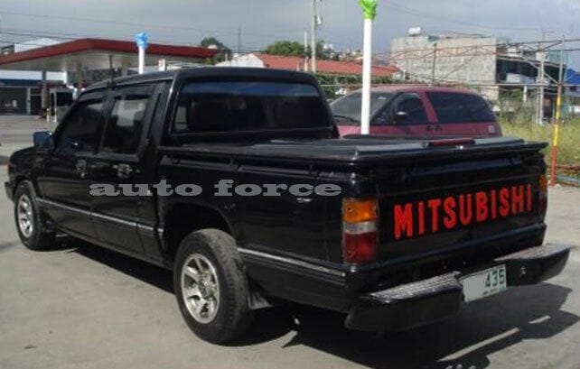 Installed View - Mitsubishi Triton MJ MH (1991-1996): Premium Window Visors