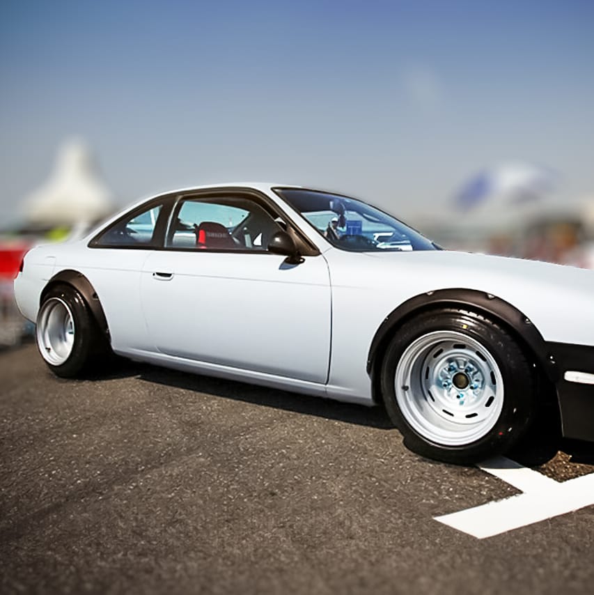 Installed View - Nissan 200SX S14: 4-Piece Wheel Flare Set