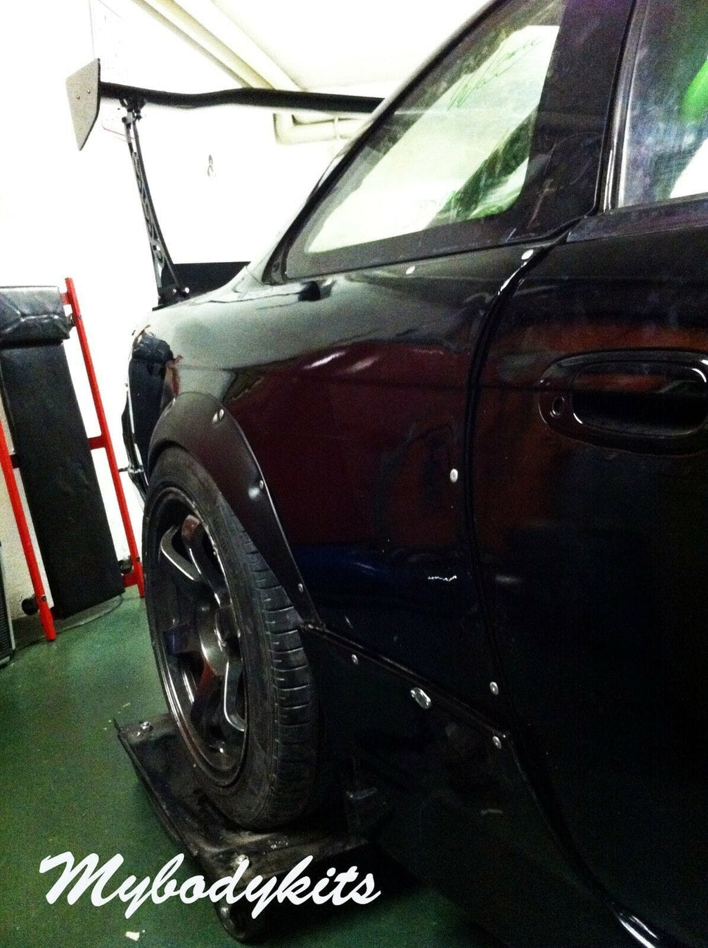 Installed View - Nissan 200SX S14: 4-Piece Wheel Flare Set