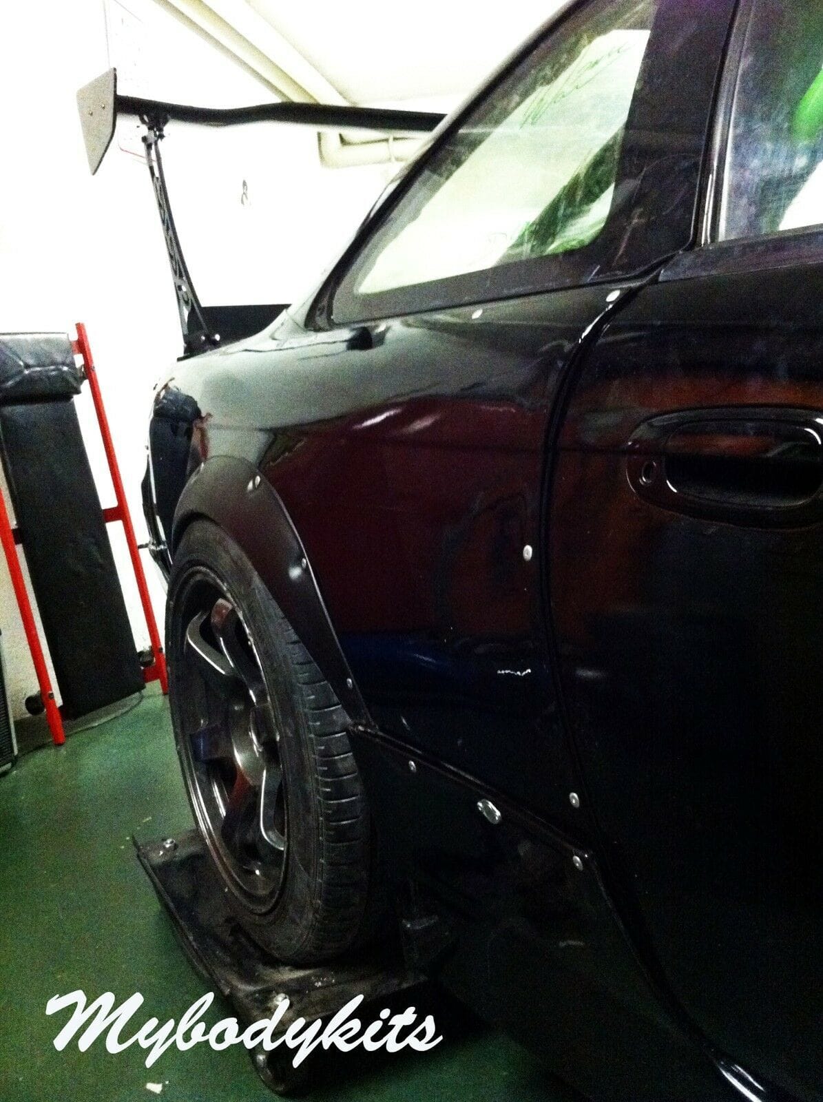Installed View - Nissan 200SX S14: 4-Piece Wheel Flare Set