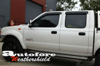 Installed View - Nissan Navara D22 Dual Cab Ute (1997-2017): Premium Window Visors