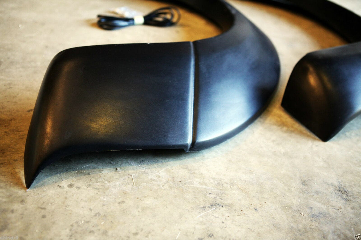 Installed View - Nissan Navara D40 Tray Back: Front Jungle Flare Set