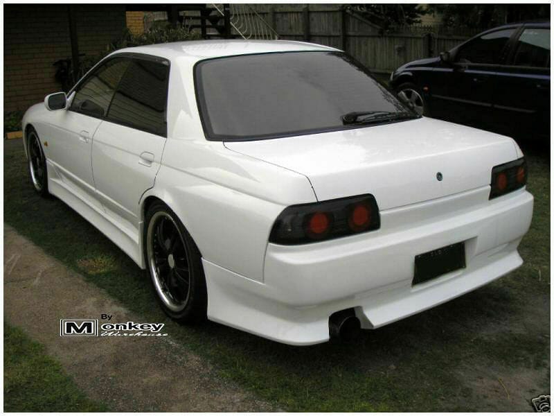 Installed View - Nissan Skyline R32 Sedan: Vertex Style Side Skirts