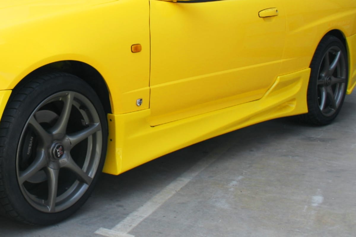 Installed View - Nissan Skyline R34 Coupe: Bomex Style Side Skirts