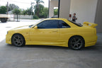 Installed View - Nissan Skyline R34 Coupe: Bomex Style Side Skirts