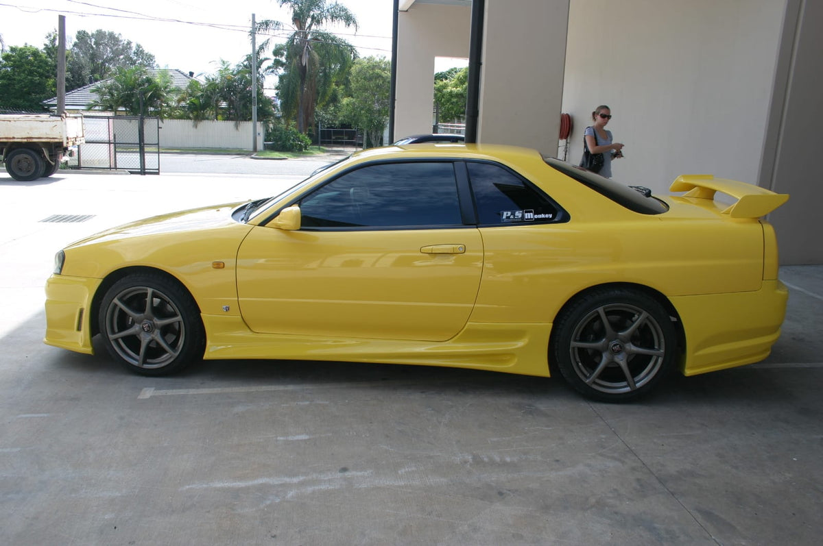Installed View - Nissan Skyline R34 Coupe: Bomex Style Side Skirts
