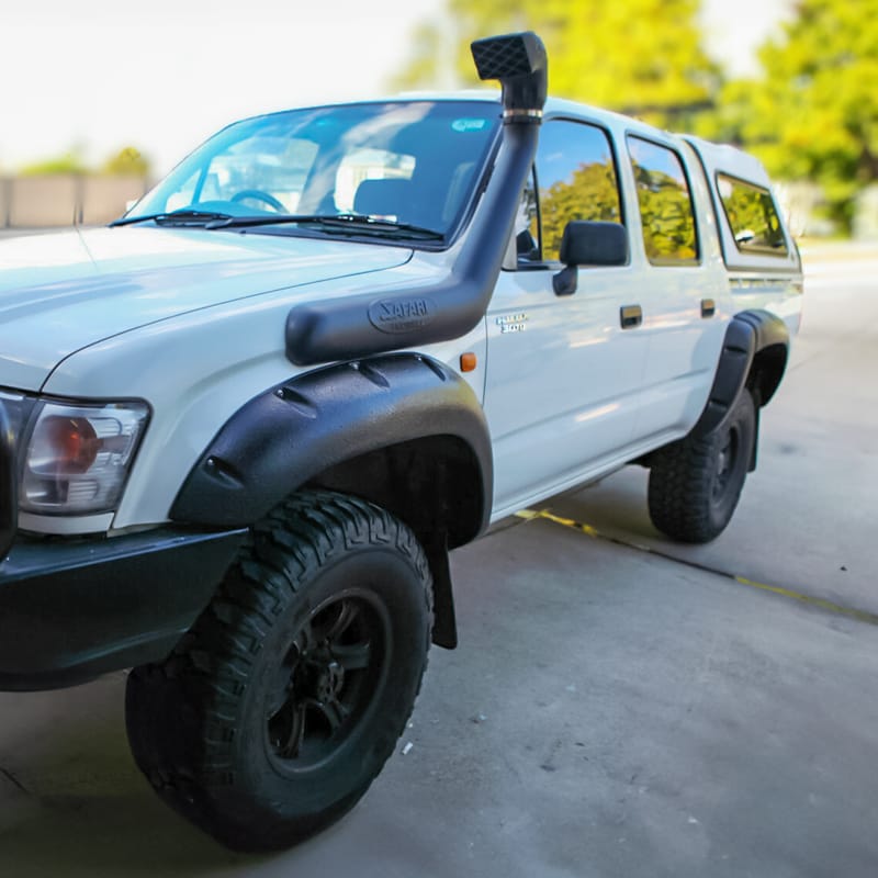 Installed View - Toyota Hilux Dual Cab 1997-2005: 4.0" Jungle Flare Full Set