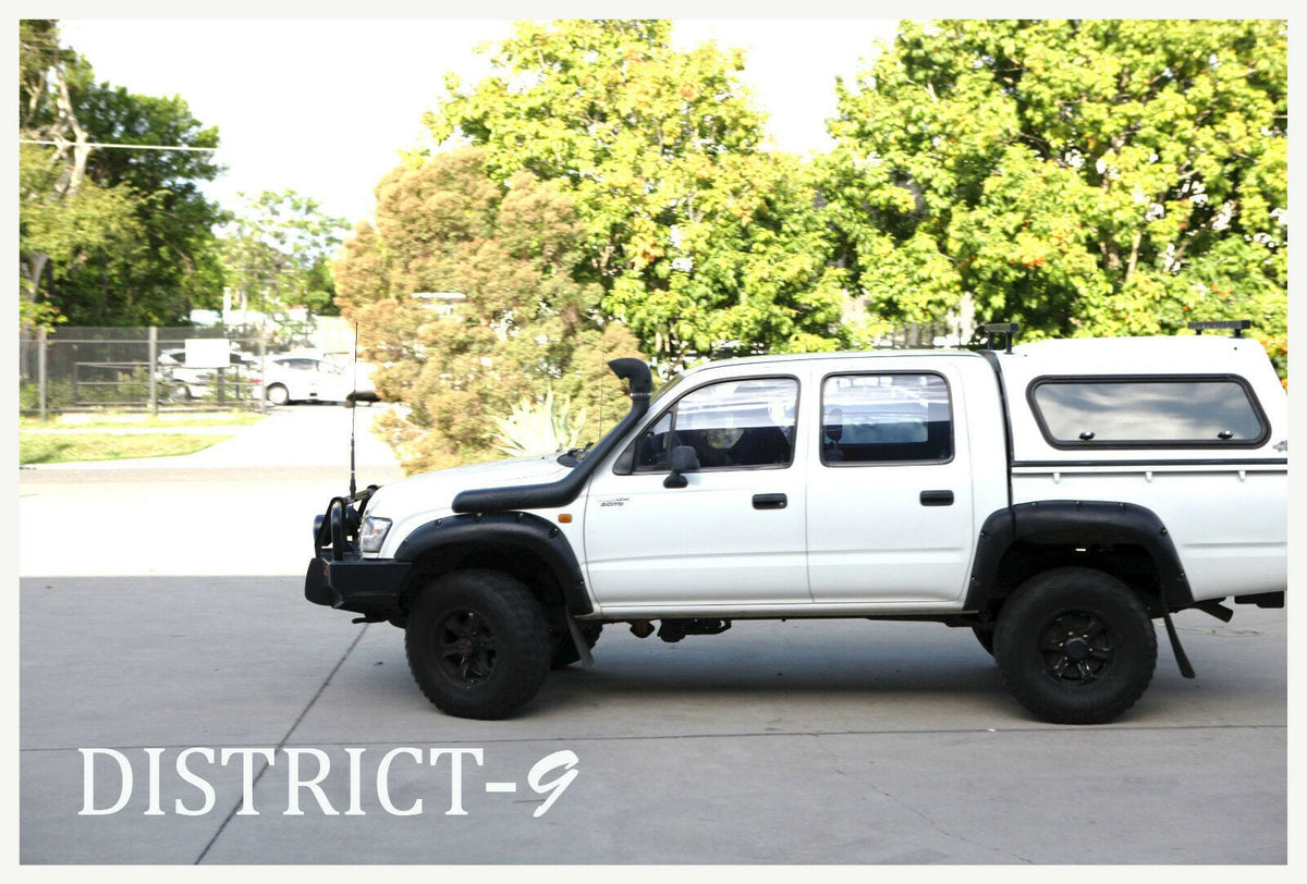 Installed View - Toyota Hilux Dual Cab 1997-2005: 4.0" Jungle Flare Full Set
