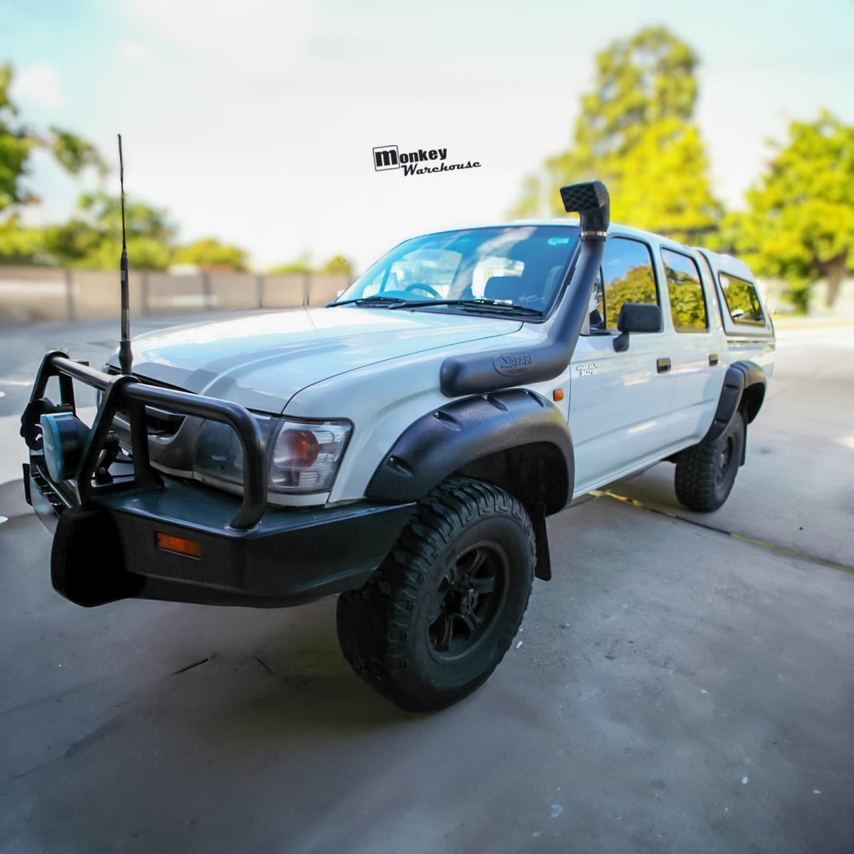 Installed View - Toyota Hilux Dual Cab 1997-2005: 4.0" Jungle Flare Full Set